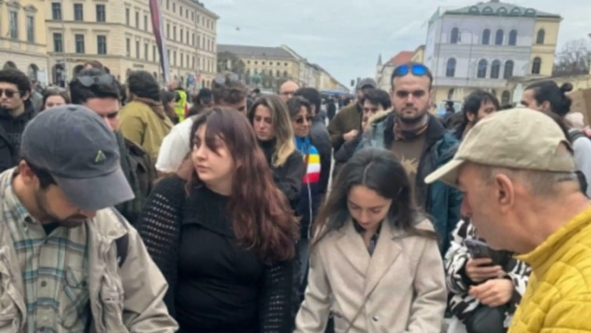 People participating in the signature campaign in Munich. People participating in the signature campaign in Munich.