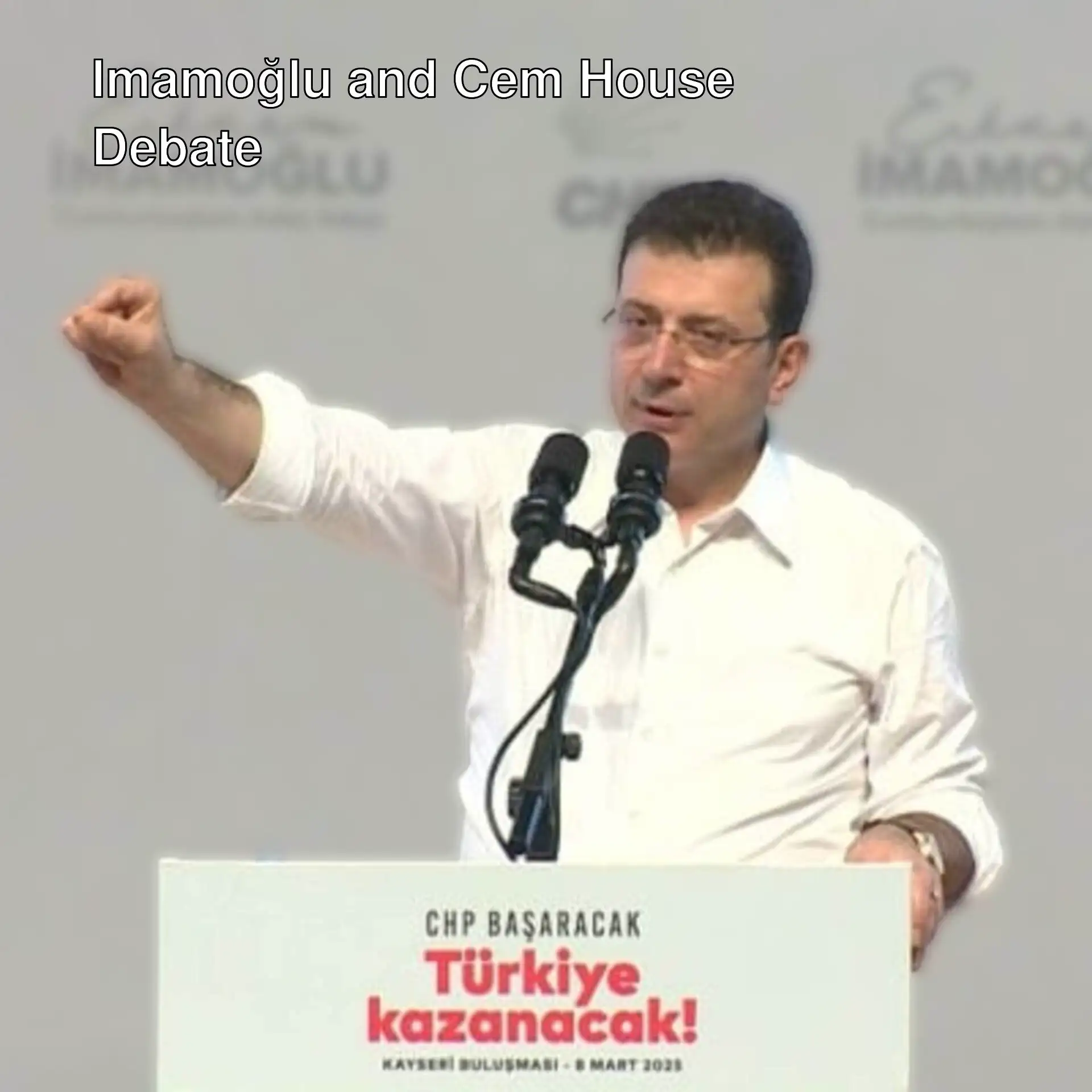 Ekrem İmamoğlu speaking at a podium. Ekrem İmamoğlu speaking at a podium.