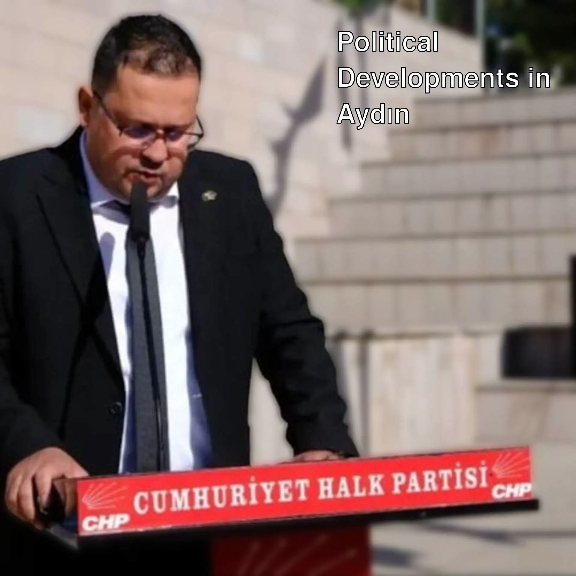 A man standing at a podium in Aydın. A man standing at a podium in Aydın.