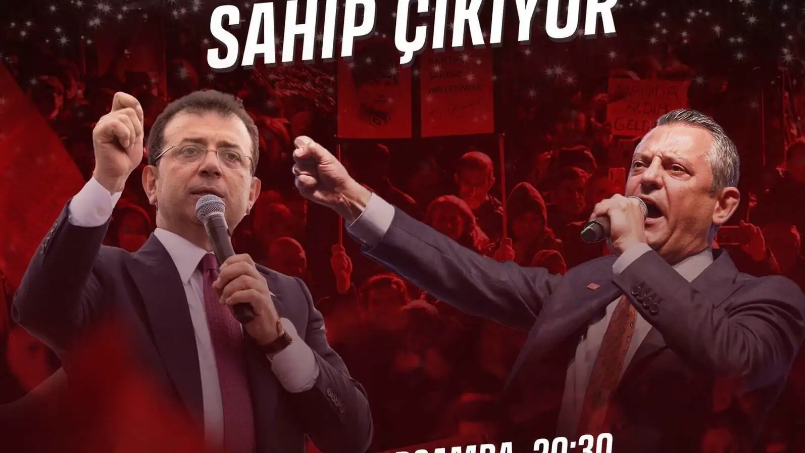 Two men holding microphones.