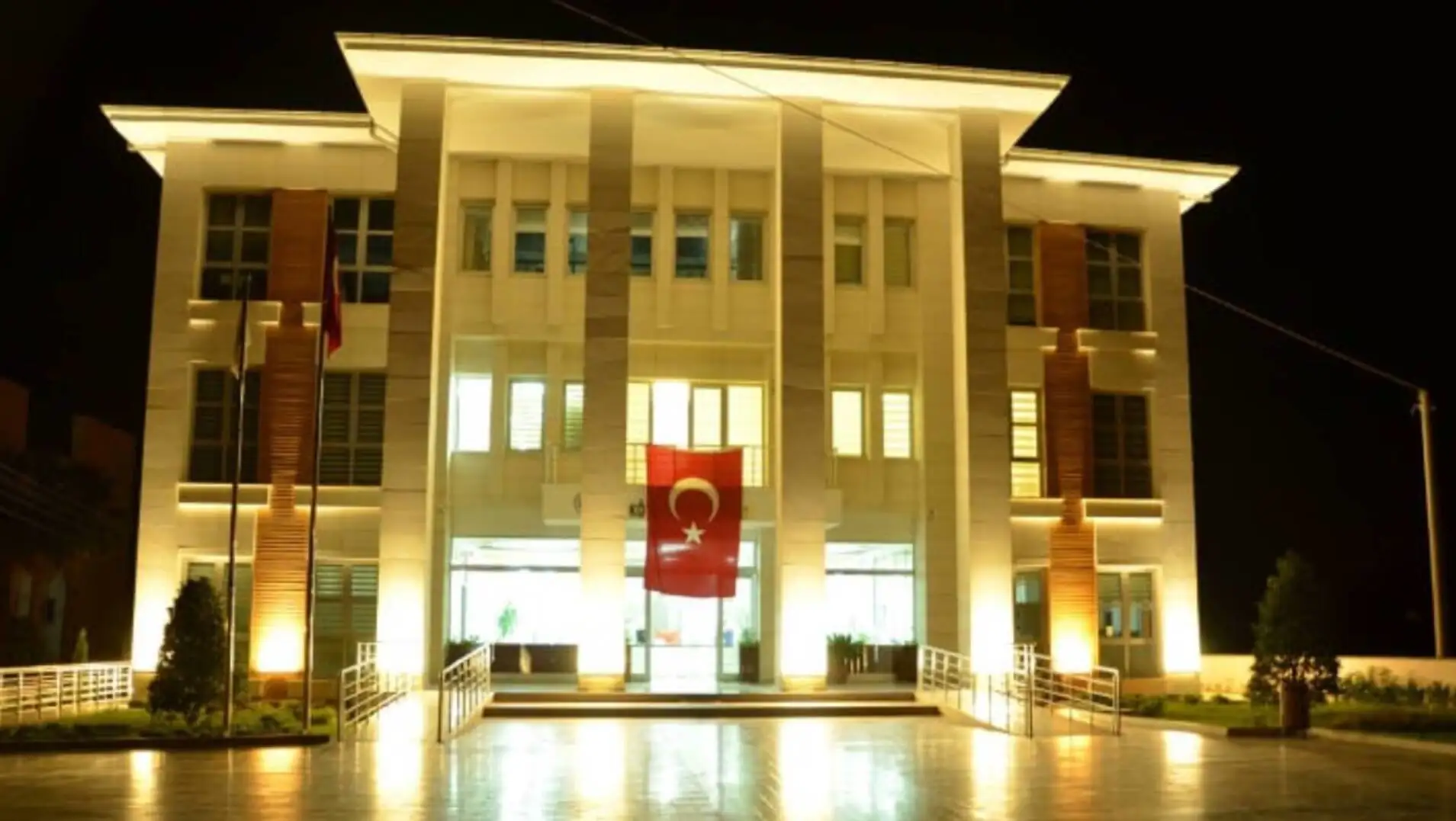 A building with flags in front of it