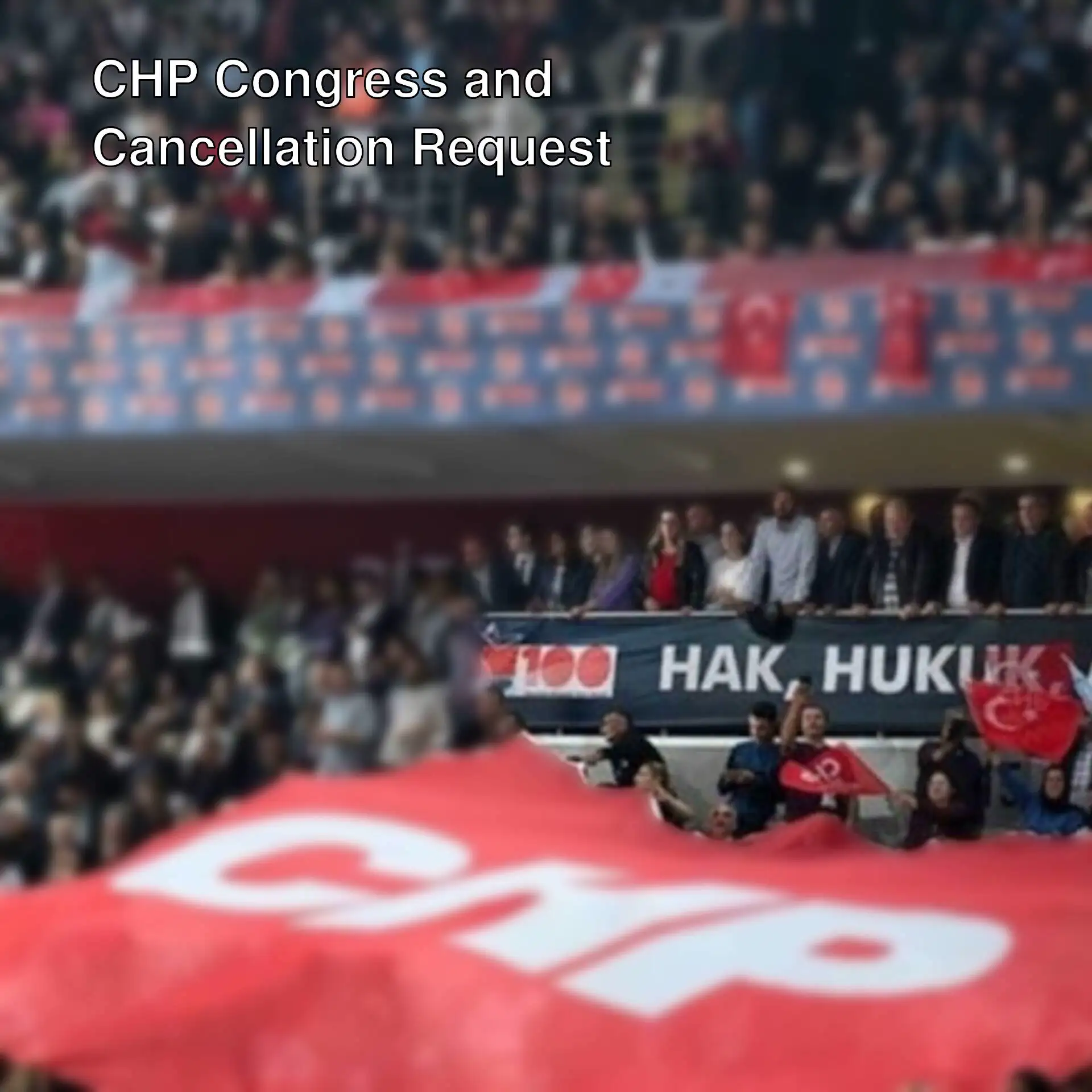 A crowd of people in a stadium.