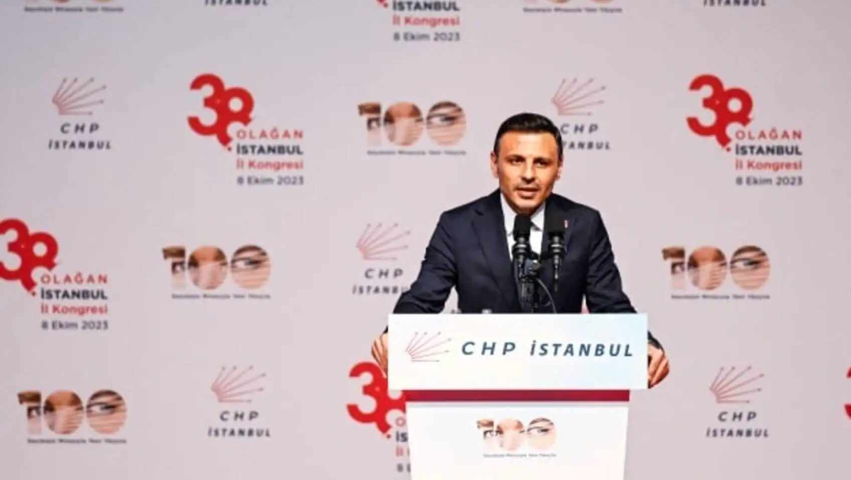 A man standing at a podium.