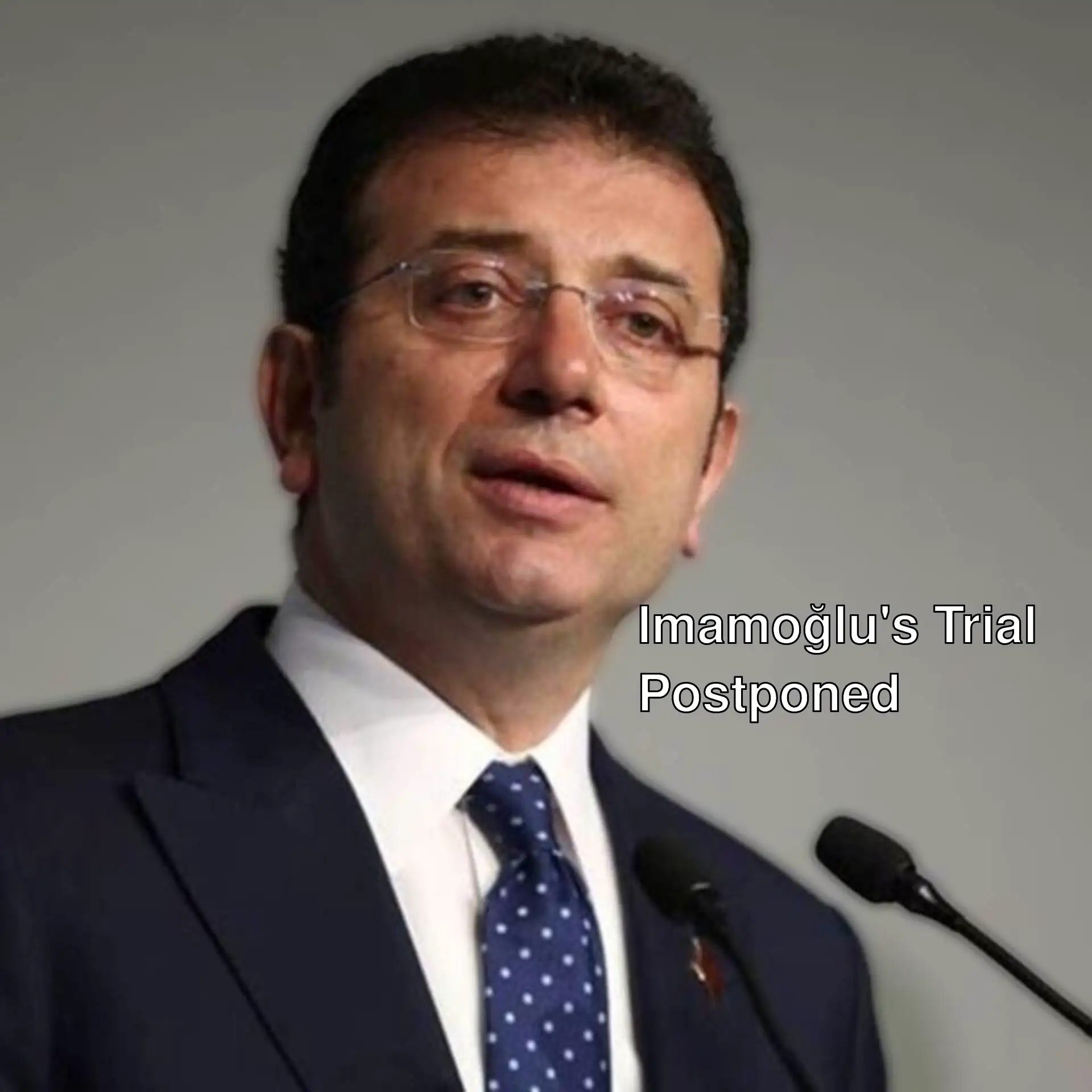 Ekrem İmamoğlu speaking at a press conference.