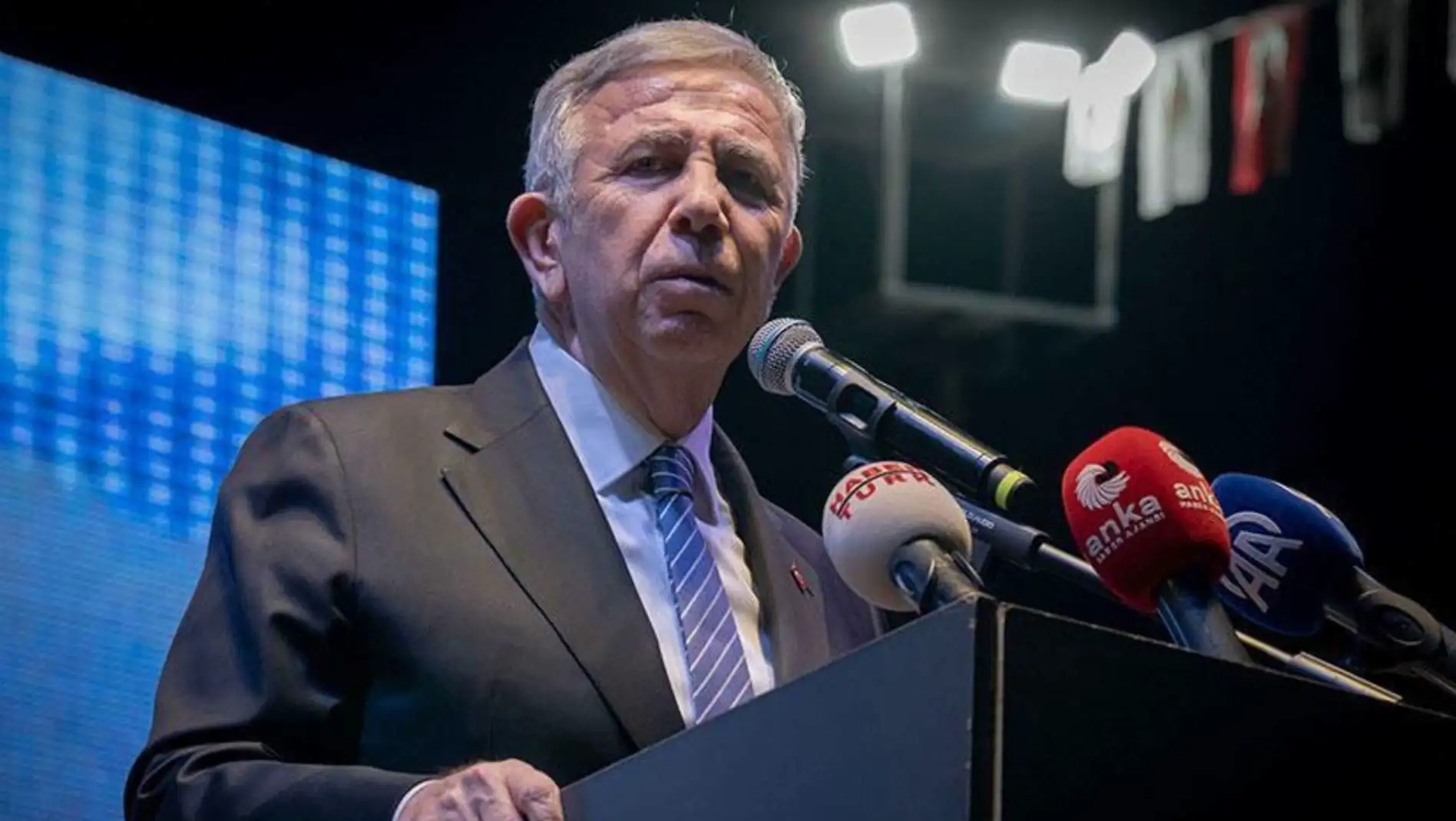 Mansur Yavaş speaking at a press conference.