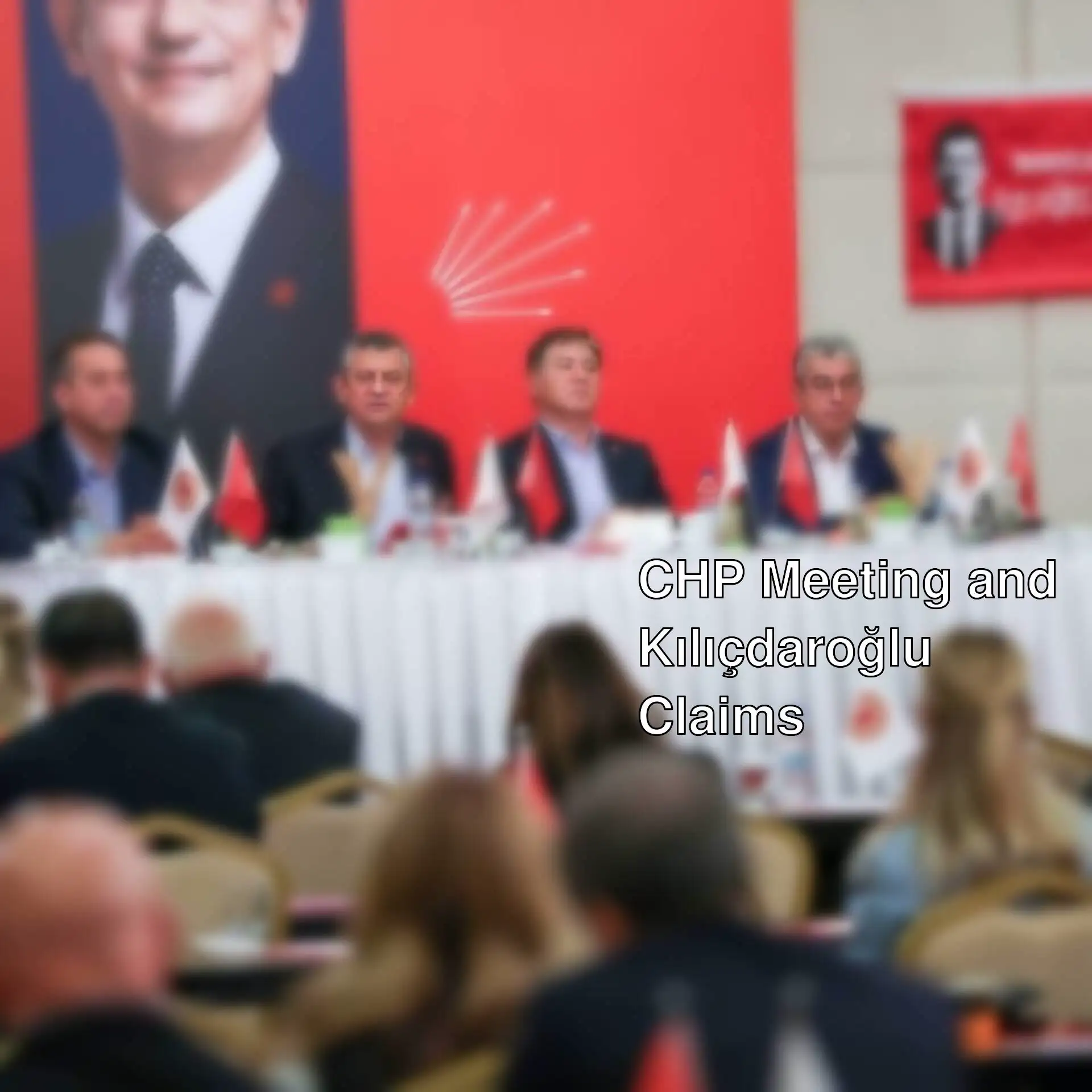 A group of people sitting at a table during the CHP meeting.
