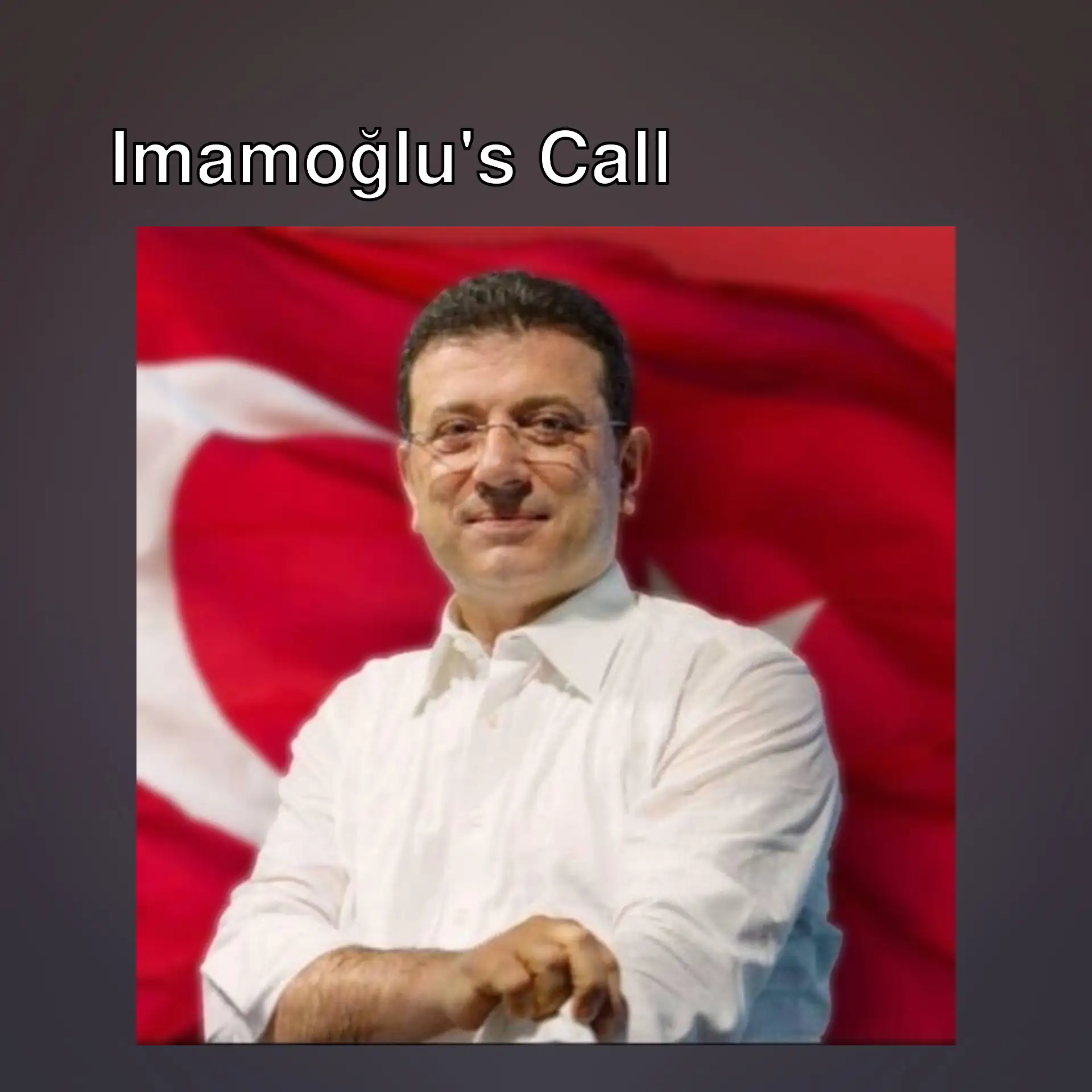 Imamoğlu standing in front of a flag. Imamoğlu standing in front of a flag.