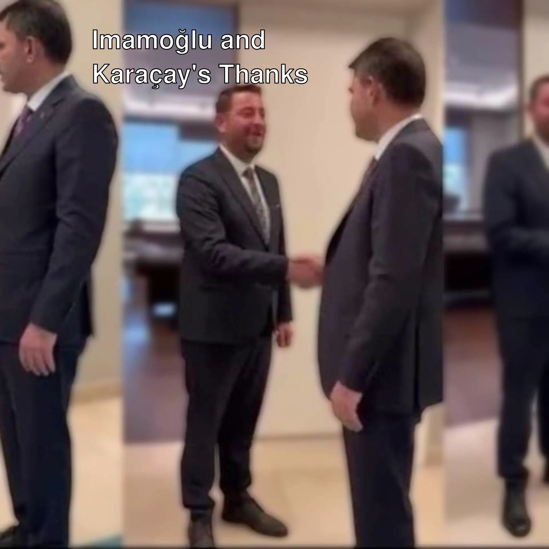 Ekrem İmamoğlu and Samandağ Mayor Emrah Karaçay shaking hands.