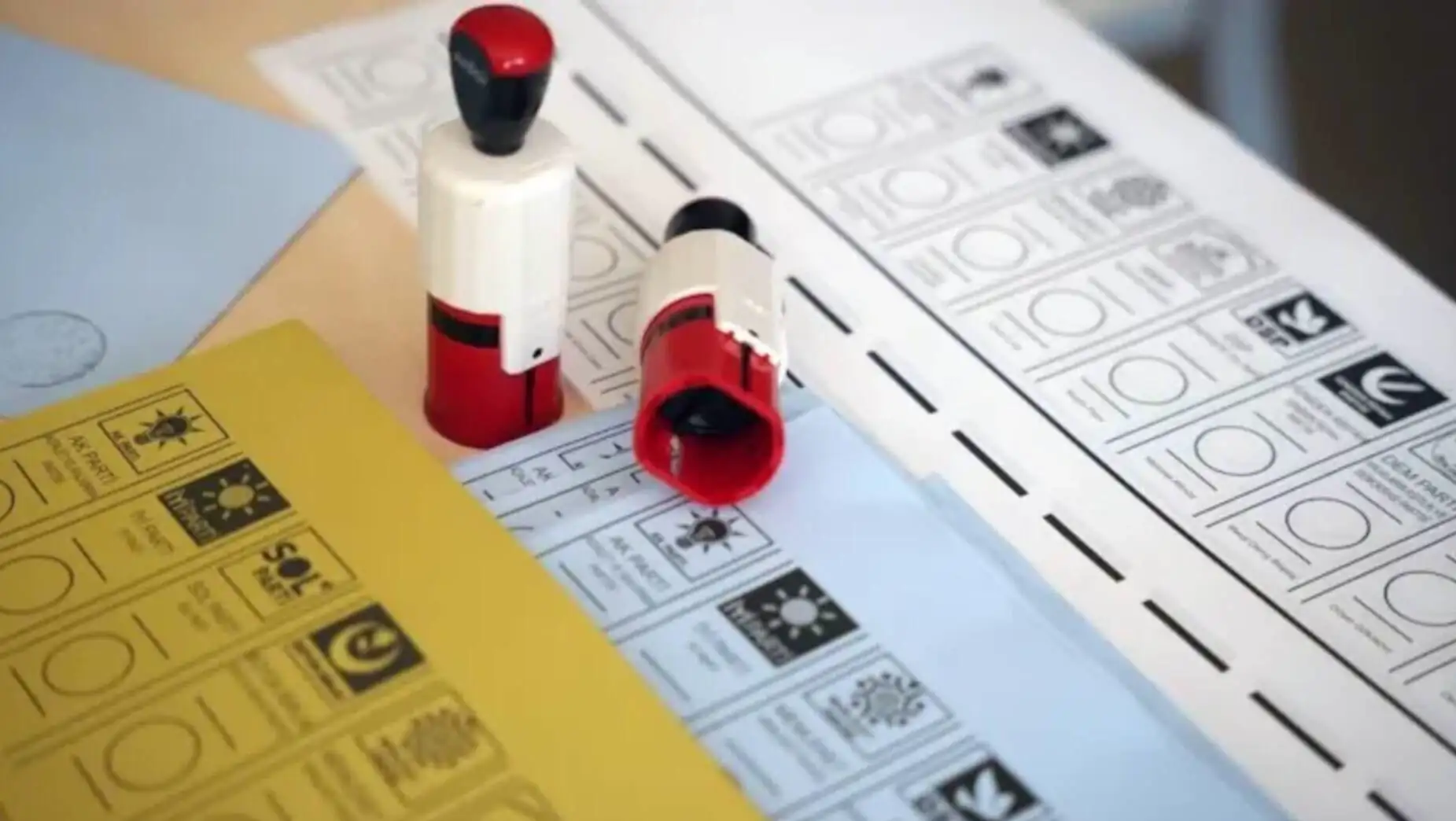 A red and white stamp on a yellow and white paper. A red and white stamp on a yellow and white paper.