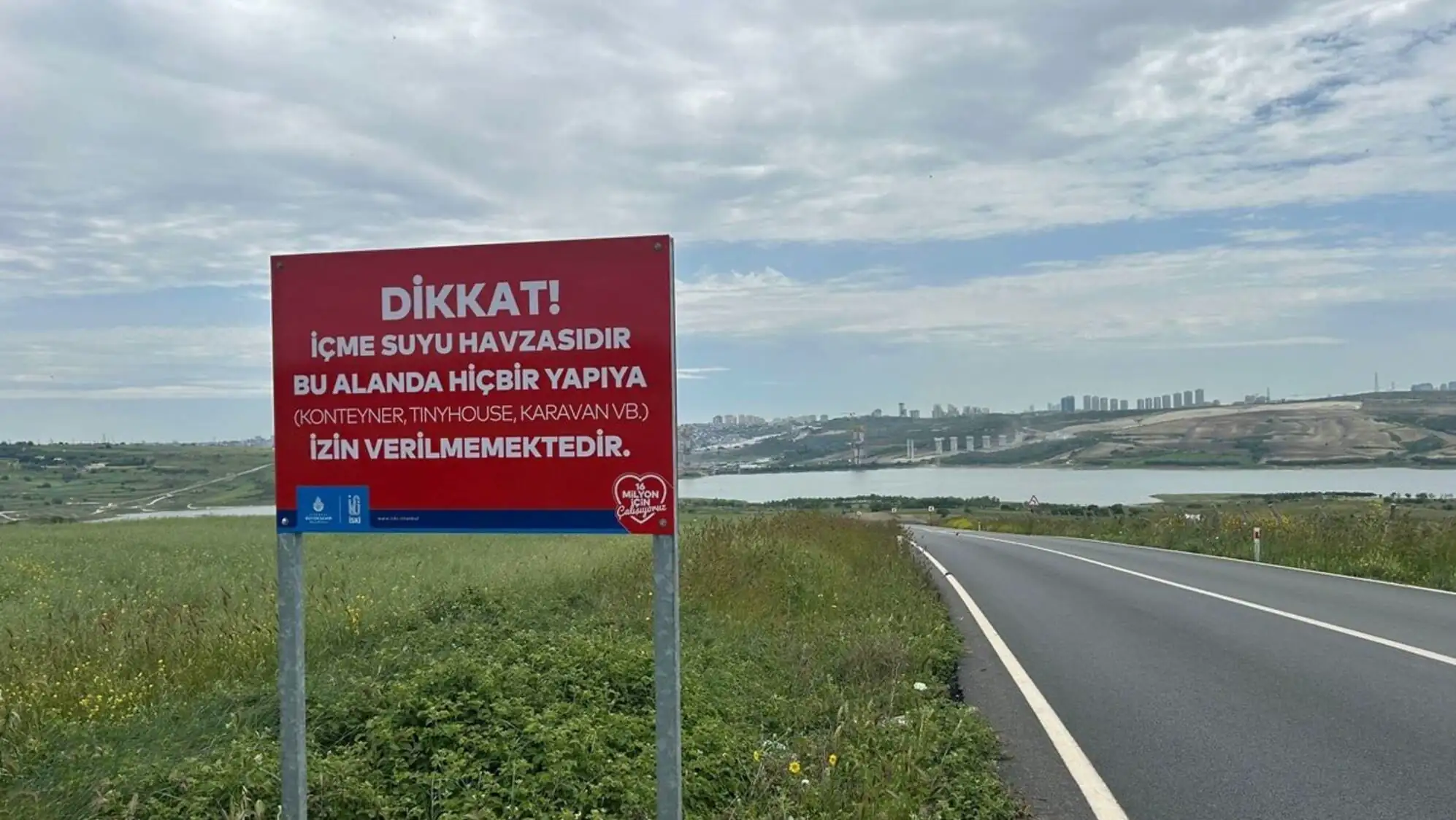 A sign on the side of a road. A sign on the side of a road.