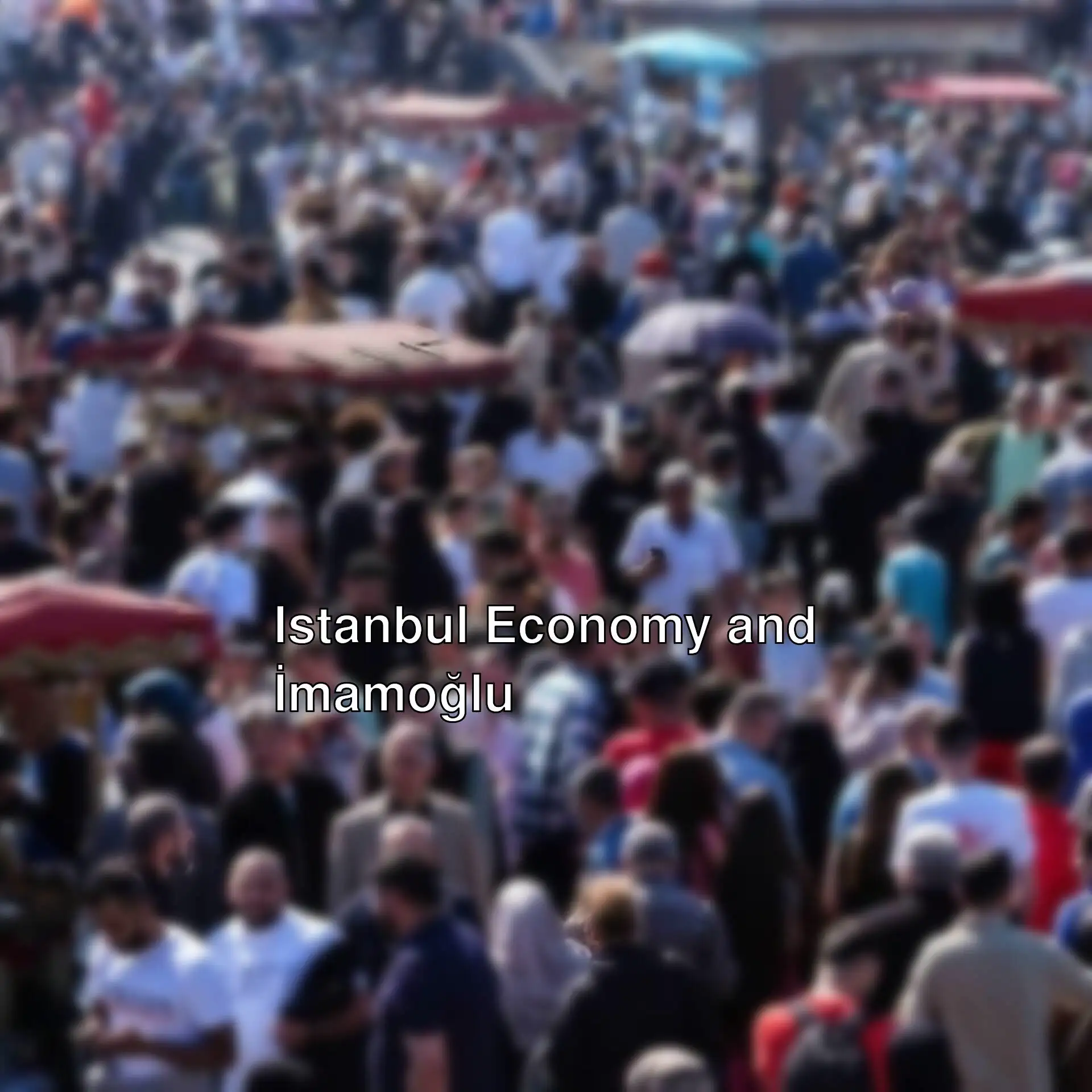 A large crowd of people walking on a street in Istanbul. A large crowd of people walking on a street in Istanbul.