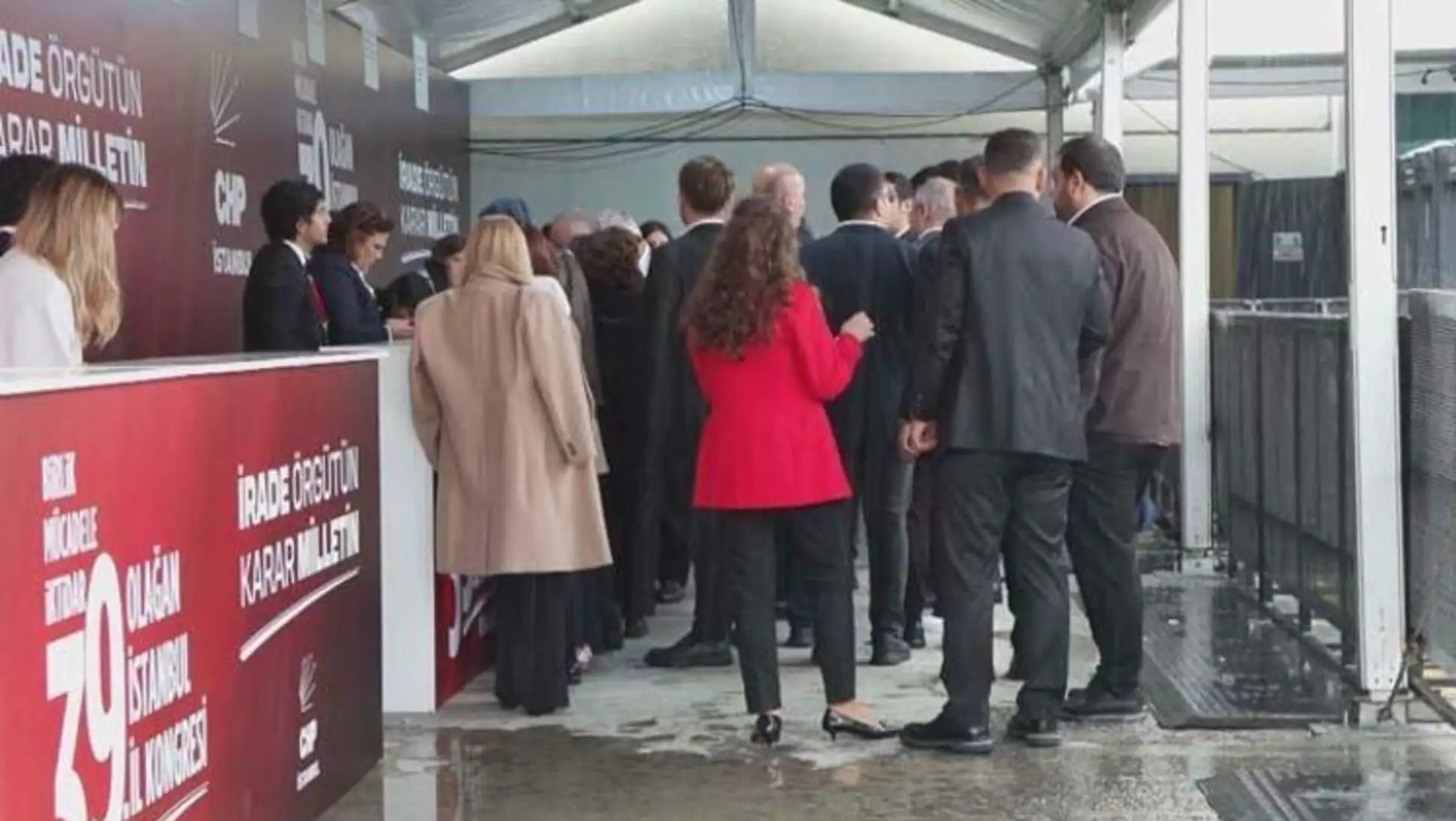 Party members are waiting in line at the congress. Party members are waiting in line at the congress.
