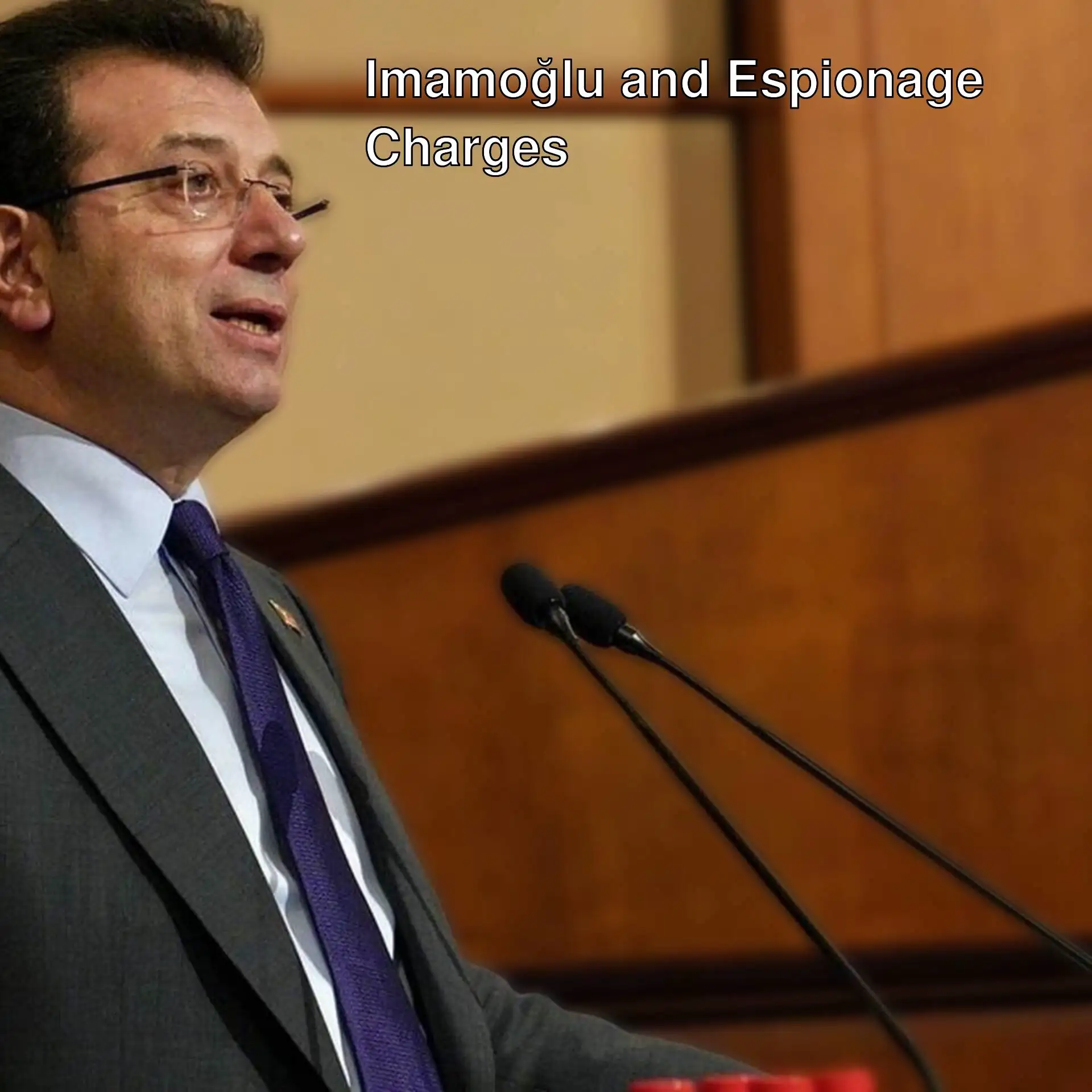 Ekrem İmamoğlu speaking at a press conference.