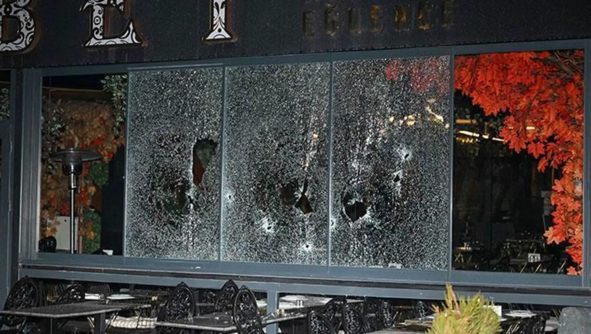 A window with many holes in it. Image from a shooting incident in Ankara. A window with many holes in it. Image from a shooting incident in Ankara.