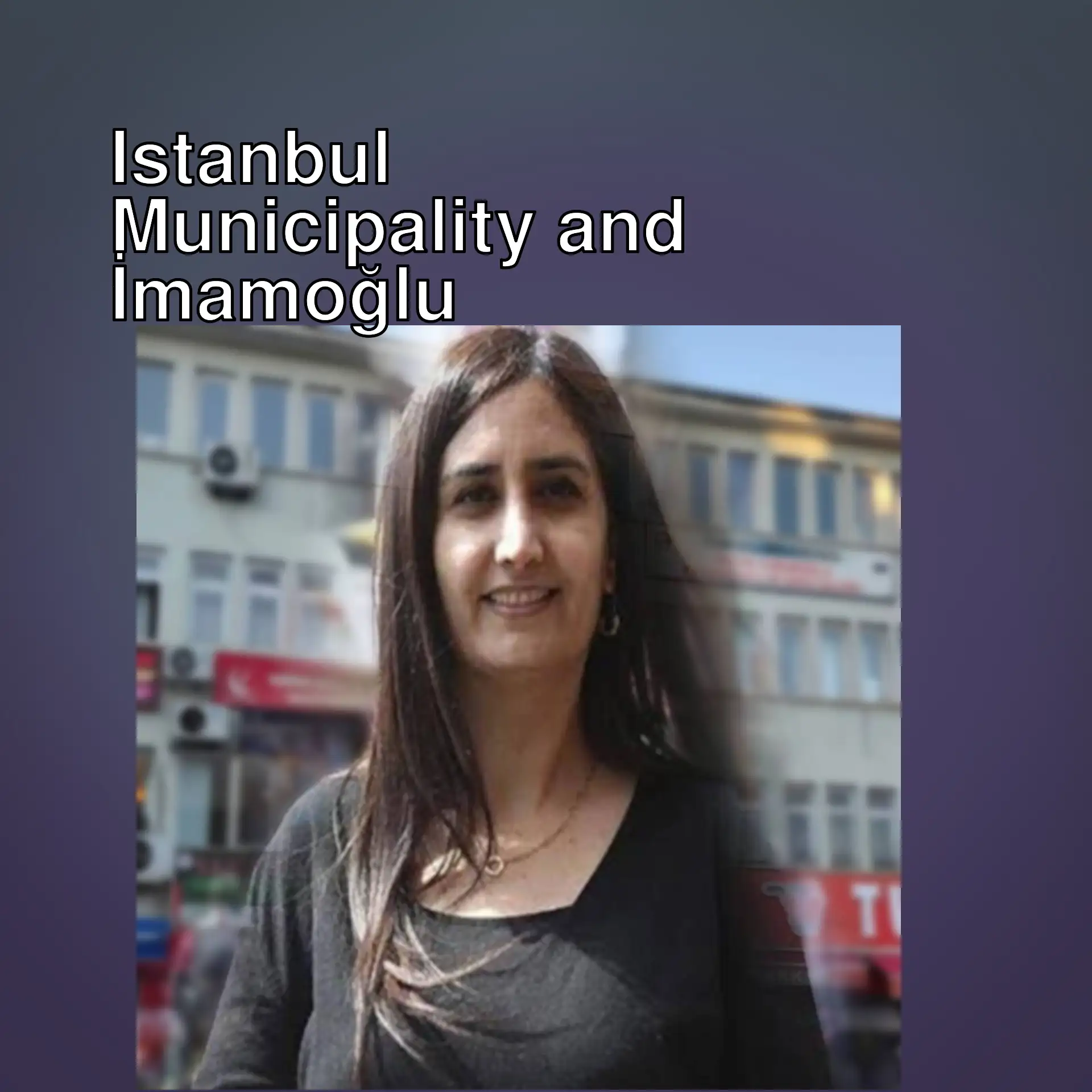 A woman in front of a building.