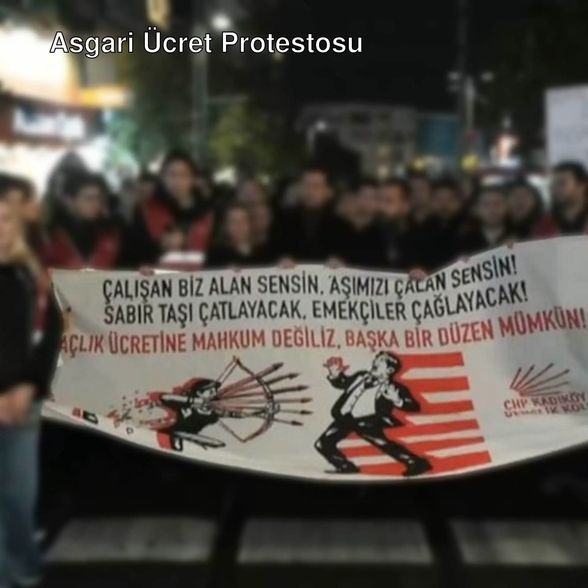 Bir grup insan pankart tutuyor.