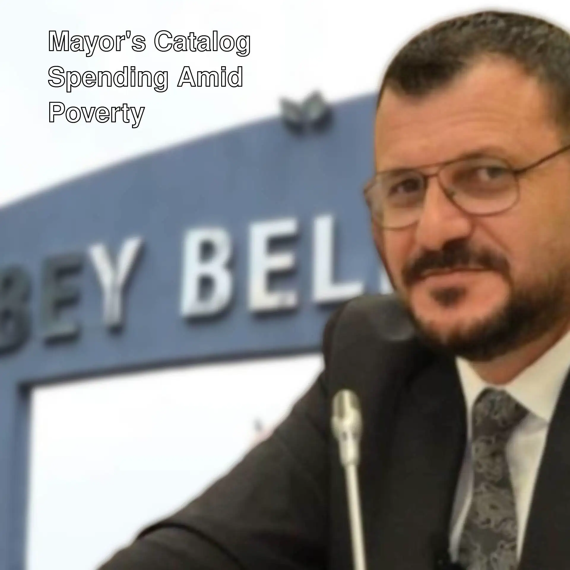 A man in a suit and tie. A man in a suit and tie.