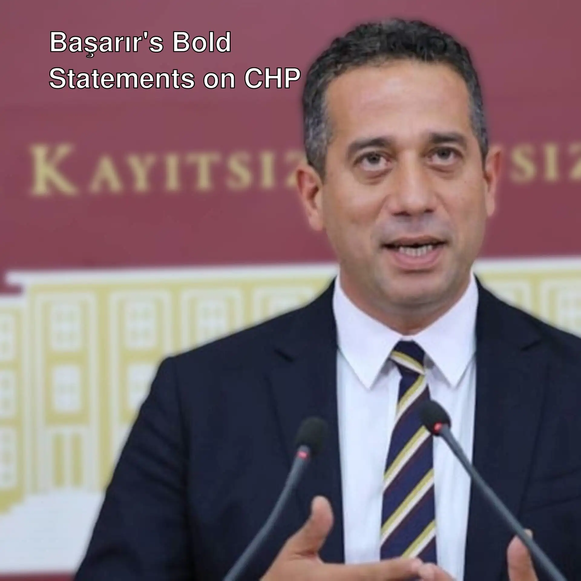 Ali Mahir Başarır speaking into microphones.