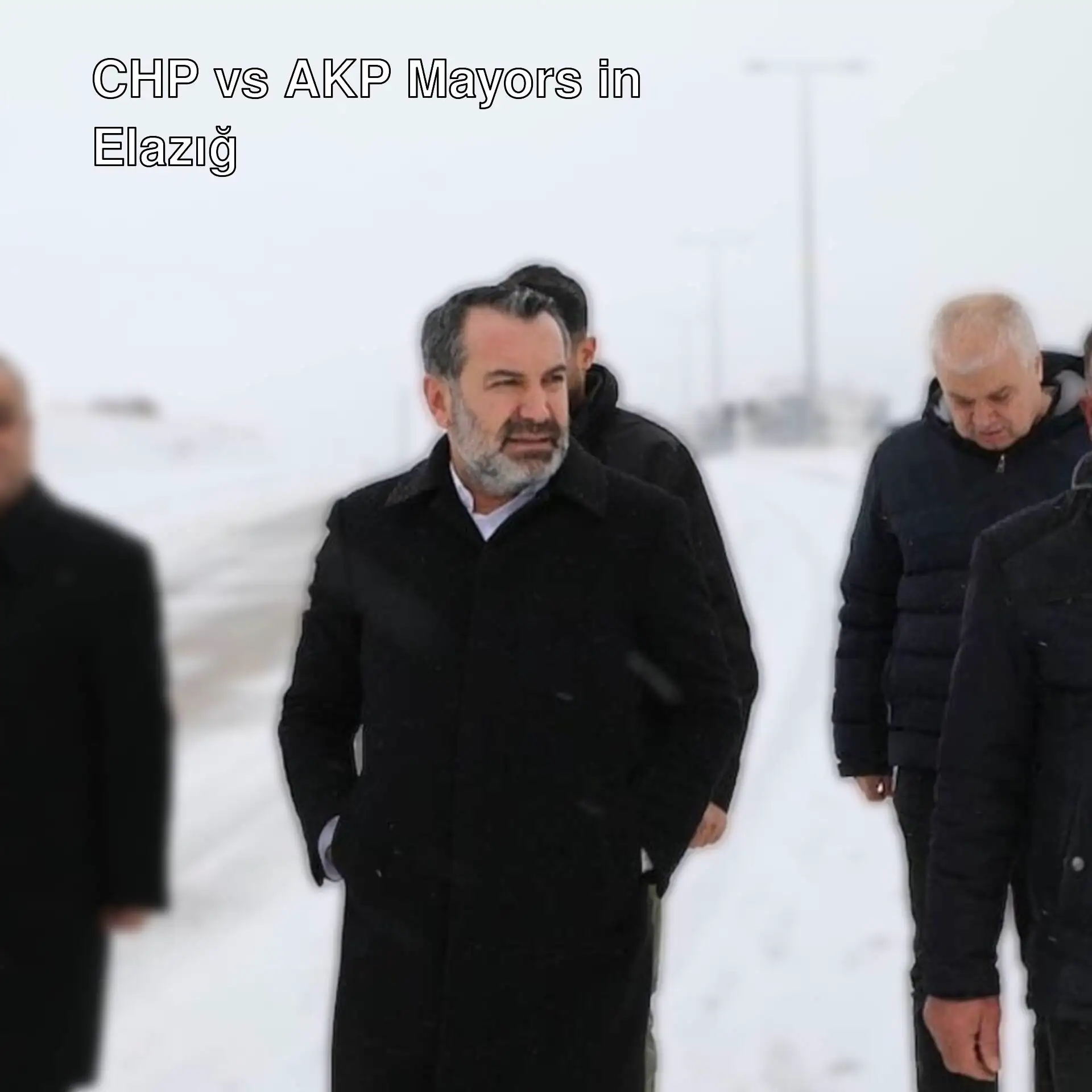 A group of people in Elazığ during snowfall.